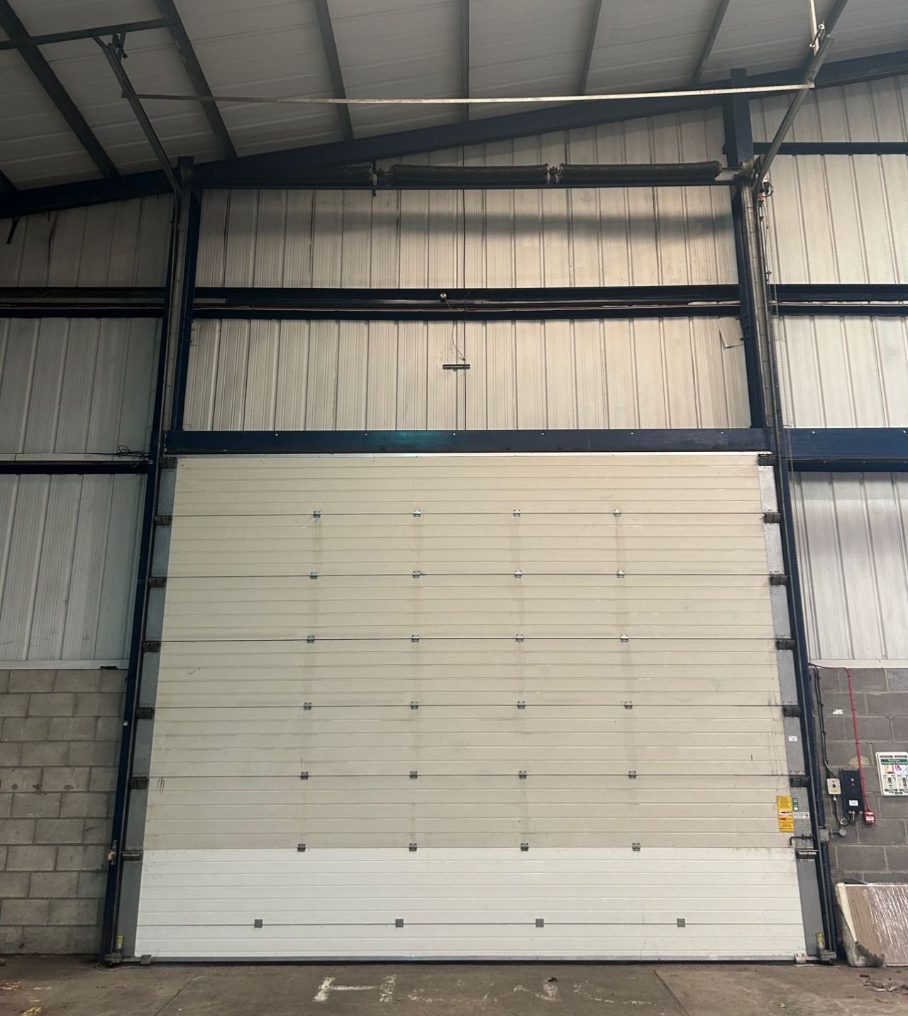 We installed Insulated Sectional Overhead Doors In Gateshead, Tyne and Wear, UK - NextGen Industrial Doors.