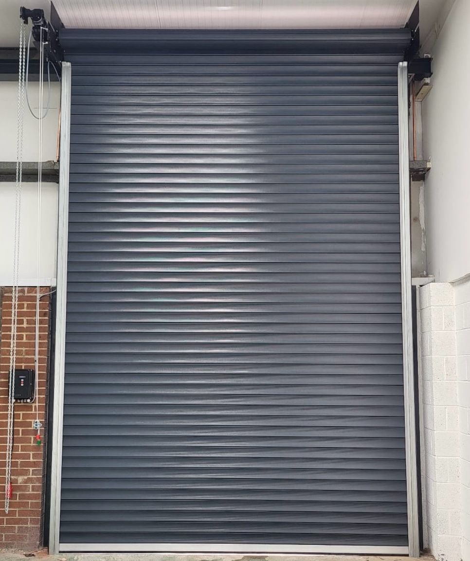 Supply and installation of 11No insulated roller shutter doors in Stoke, UK - NextGen Industrial Doors