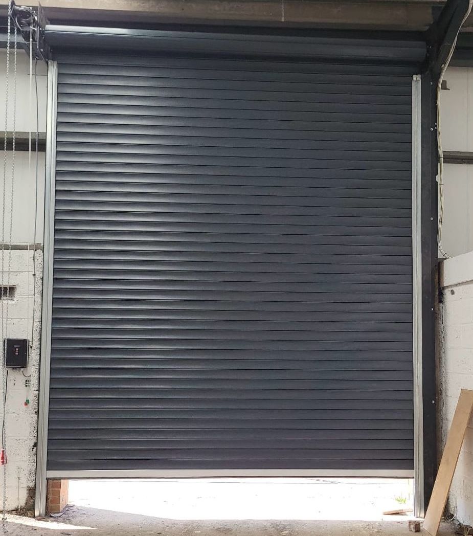 NextGen Industrial Doors- Supply and installation of 11No insulated roller shutter doors in Stoke, UK.